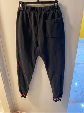 Champion Black Joggers with Red Trim and Pocket